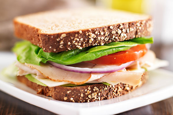Sandwich read-to-go with turkey, tomatoes, and lettuce